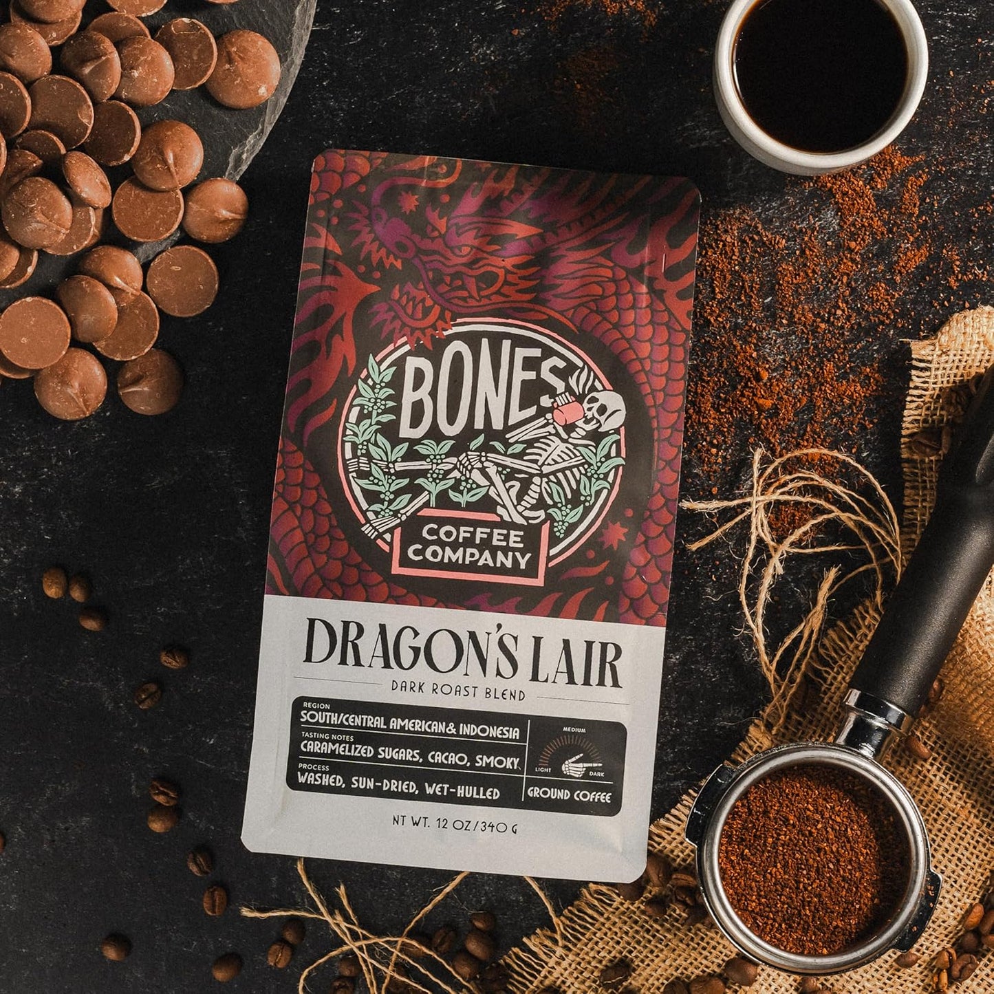 Bones Coffee Company Dragon's Lair, Smokey, Cacao and Caramelized Sugar Notes, Unflavored Coffee, Medium Roast Low Acid Arabica Beans Compatible with Auto drip and French Press Coffee Maker, 12 Oz Ground